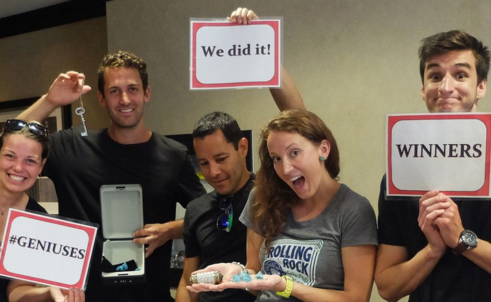 Team celebrating after completing an escape room